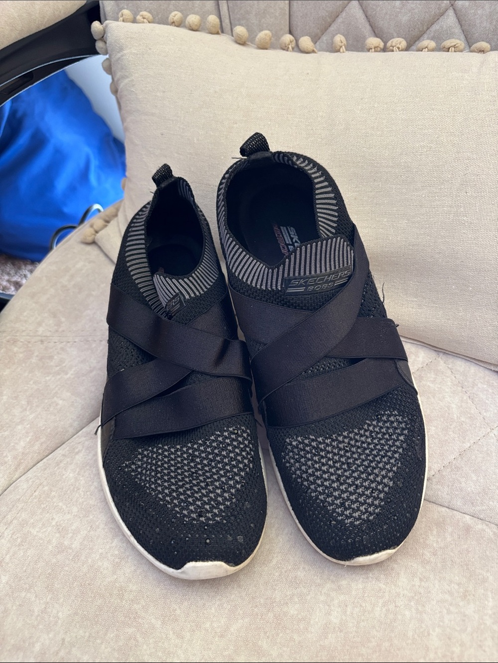 Skechers Women’s Black Slip-On Cross-Strap Knit Sneakers with sparkly front.